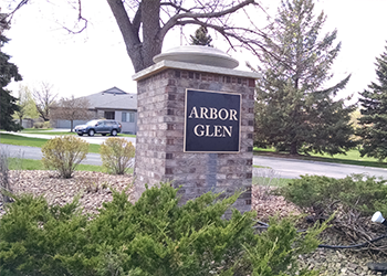 Arbor Glen housing development outdor metal plaque